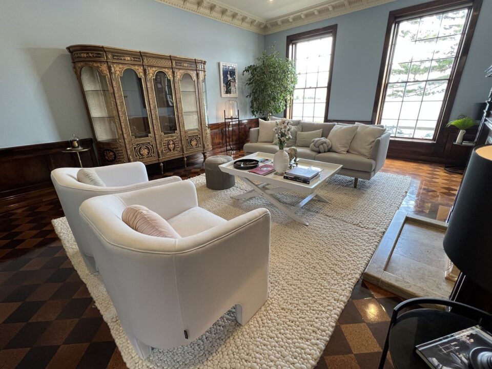 Lounge with vase on coffee table that matches colour scheme