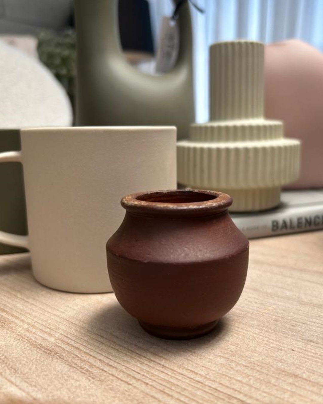 Stoneware vase on shelf