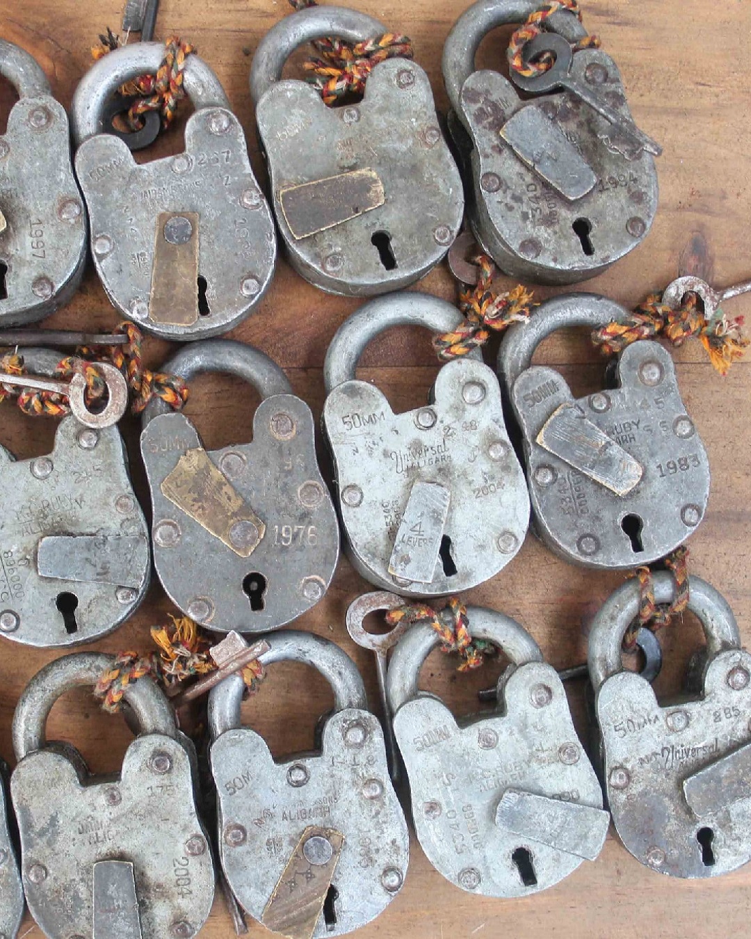 Vintage railway padlocks on table