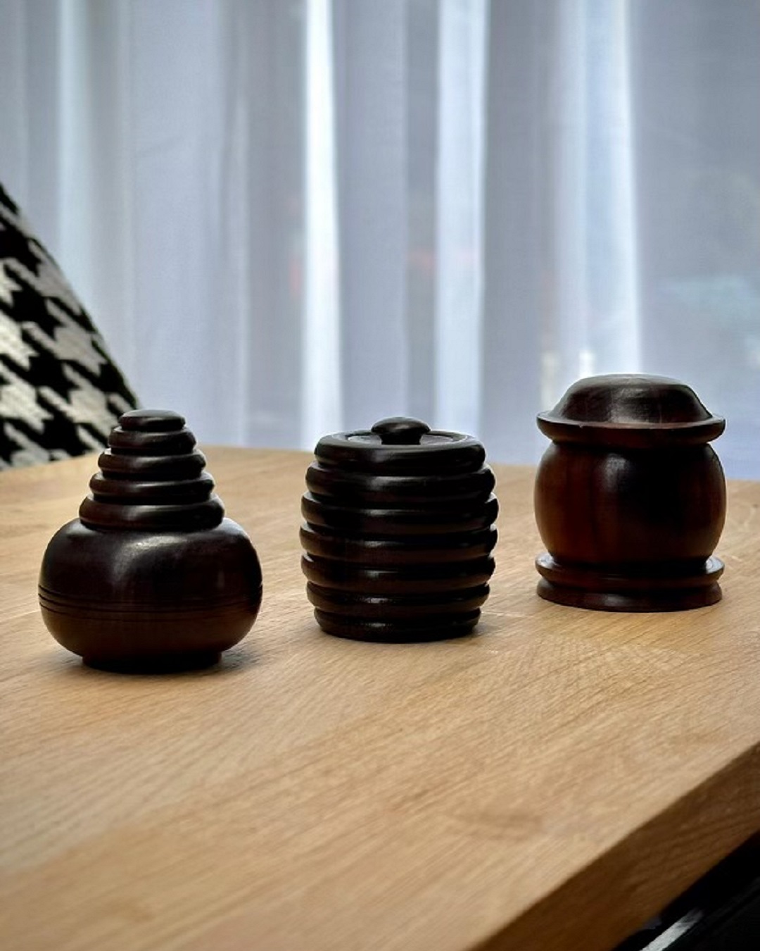 Wooden containers hand woven on table