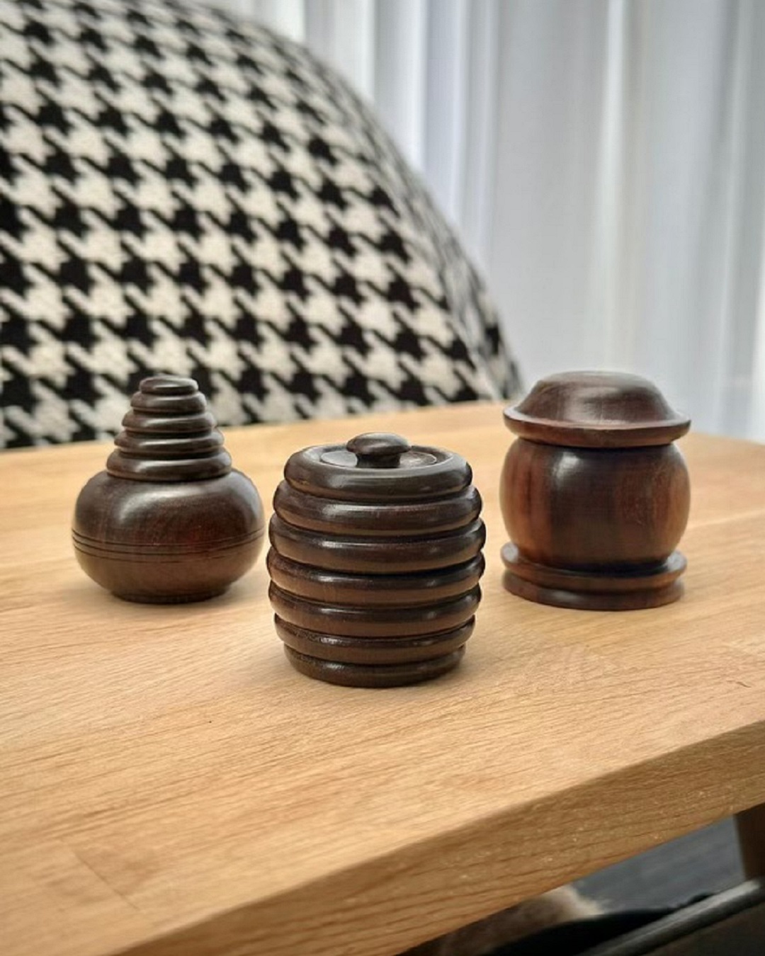 Wooden containers hand woven on table