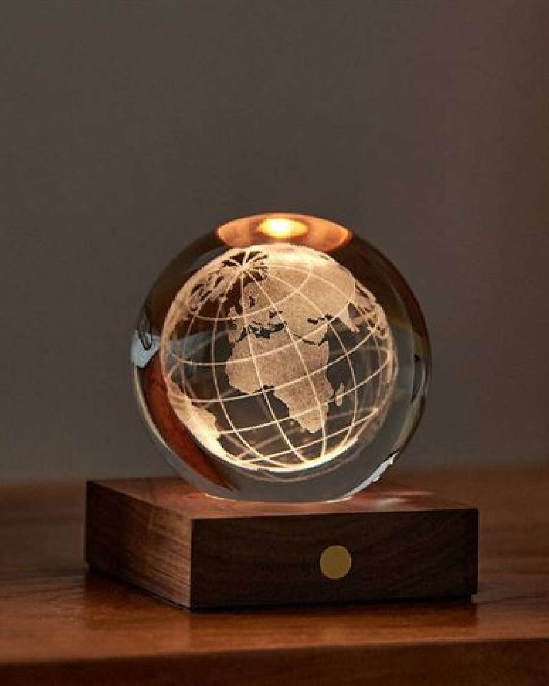 World globe light on wooden stand
