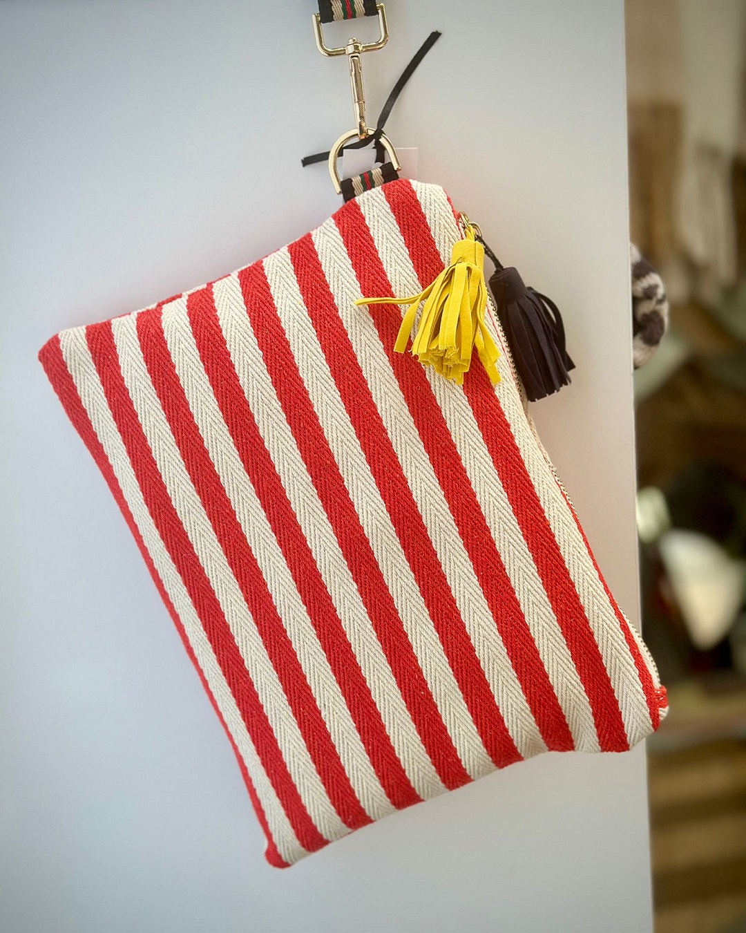 Red and white stripe back with black and gold tassels