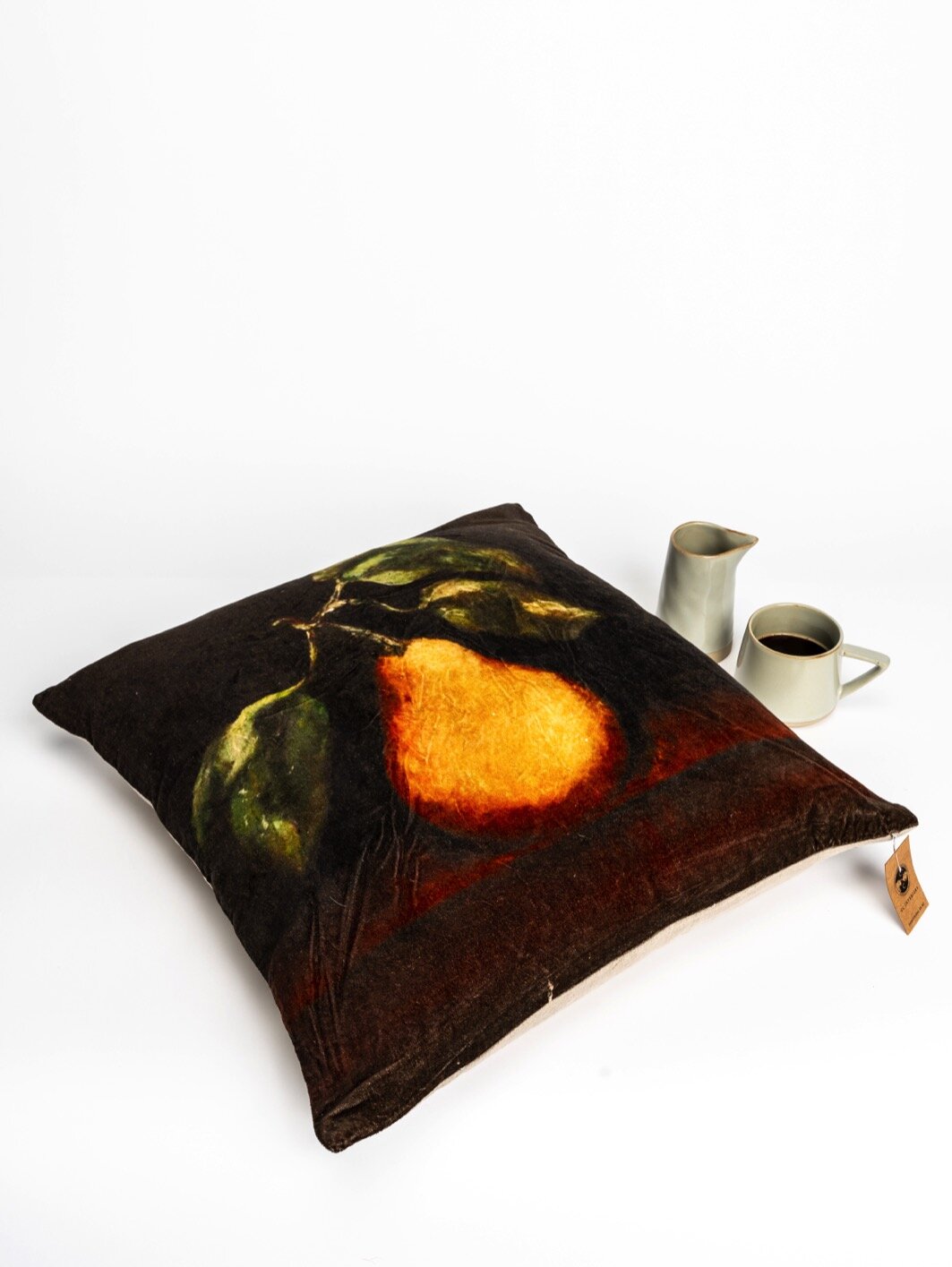 Velvet cushion with pear on front